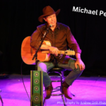 Michael Peterson with guitar